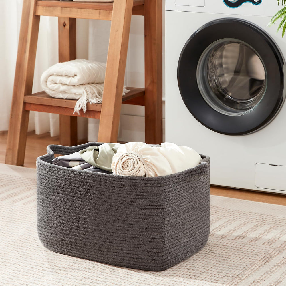 OIASKET portable basket with sturdy handles for easy moving around the home.
