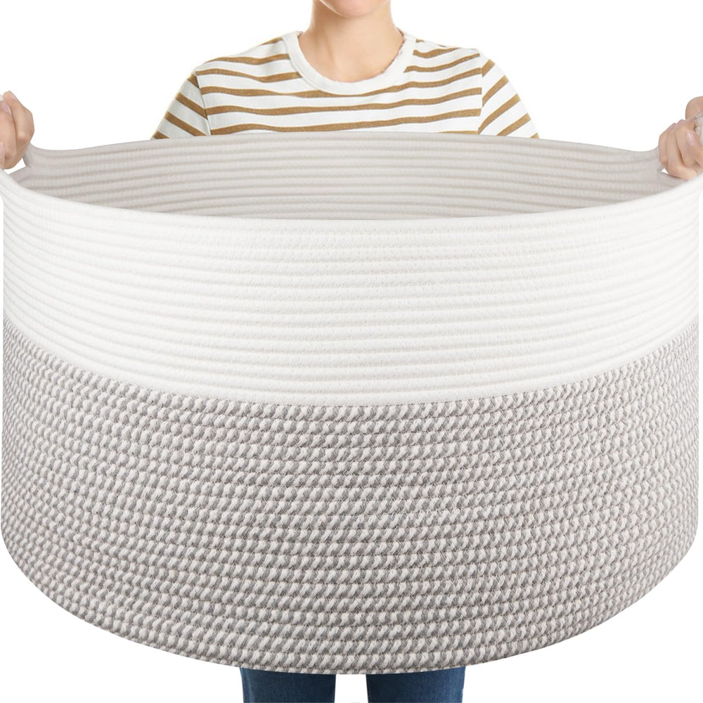 OIASKET organization basket tidies towels, pillows, and clothing.