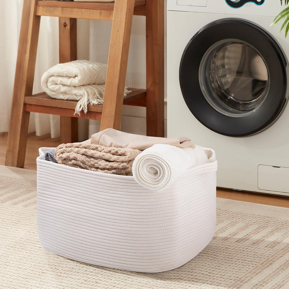 OIASKET white storage basket folds flat for easy space-saving storage.