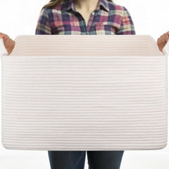 OIASKET white storage basket organizing blankets and toys for a tidy living room.