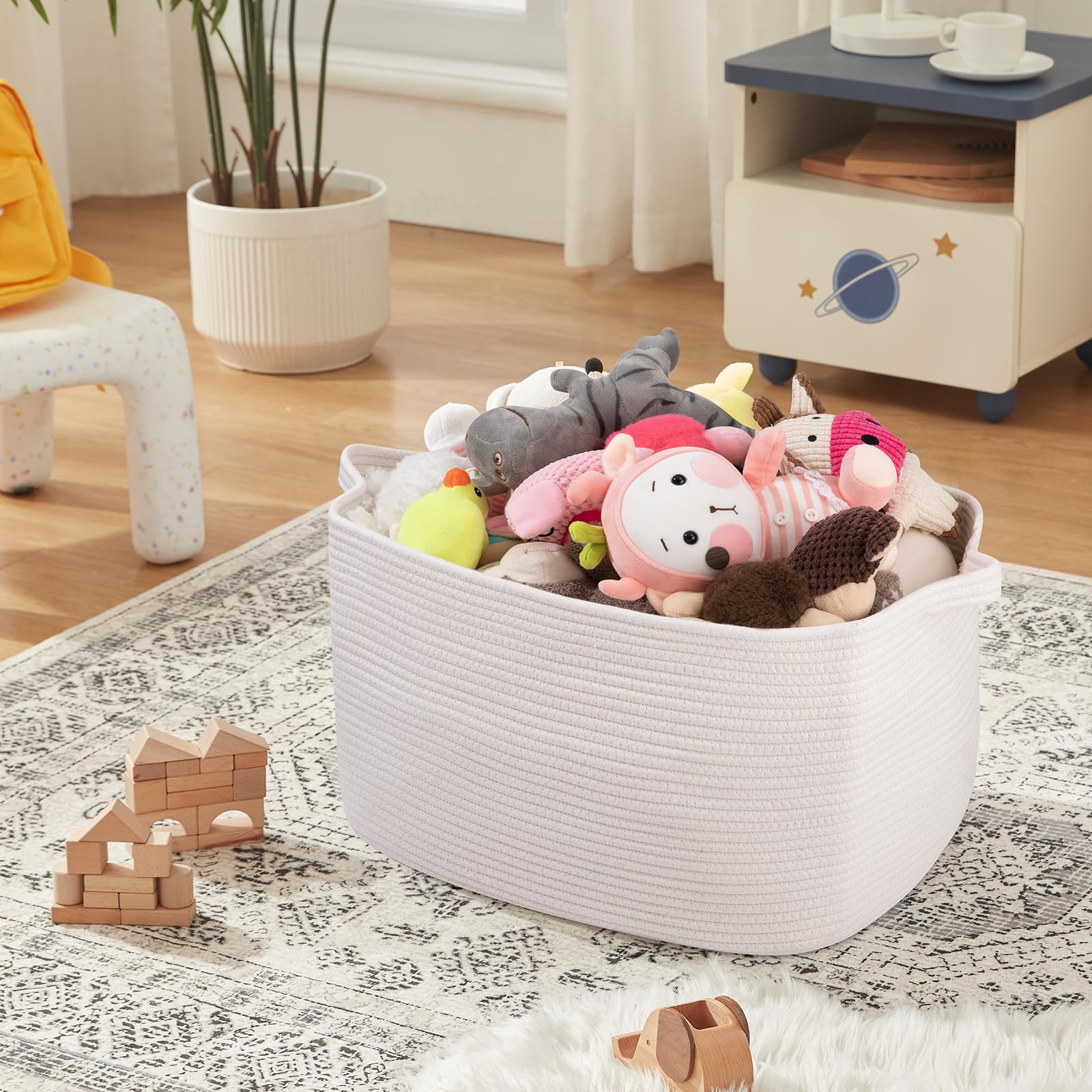 OIASKET basket with handles is portable for moving toys and laundry.