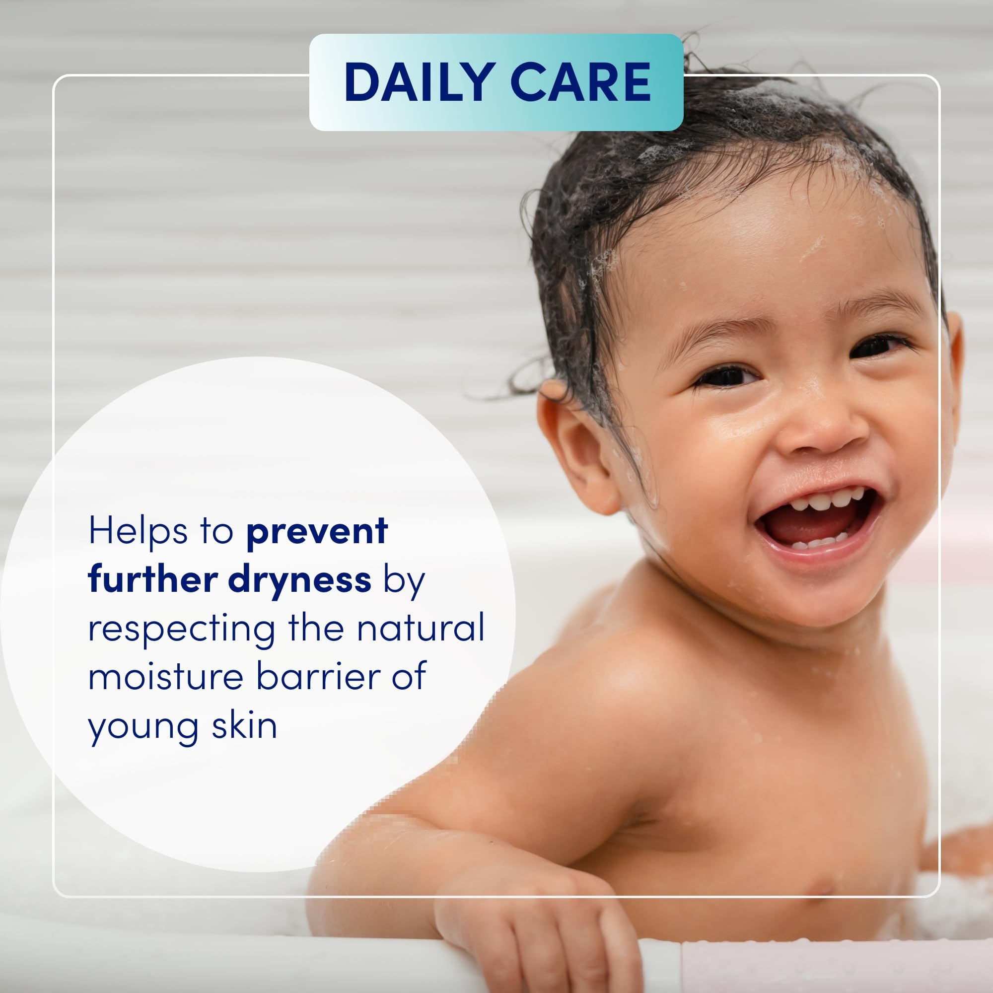 Oilatum Daily Junior Head To Toe Wash bottle close-up emphasizes soap-free, eye-friendly cleansing.