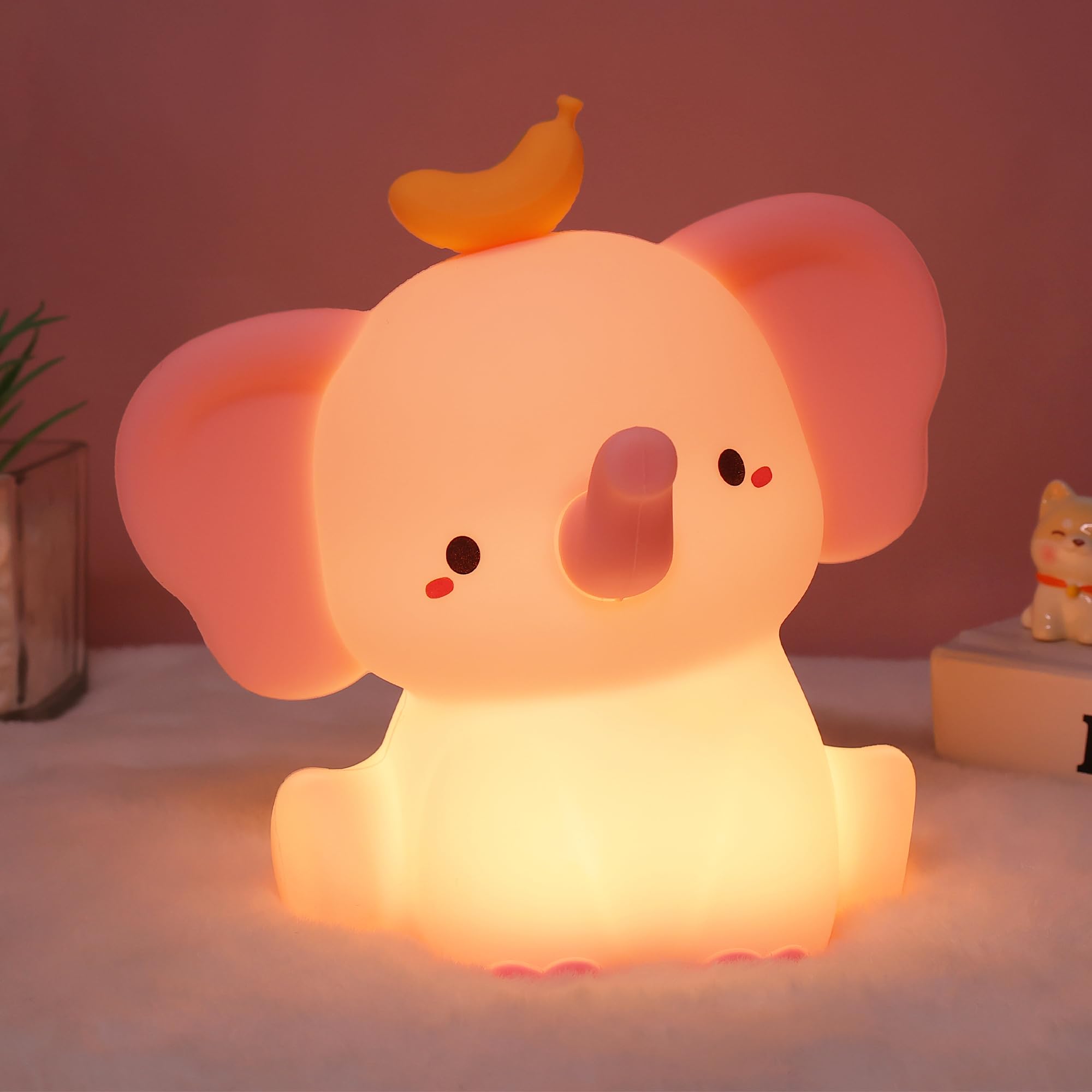 OkiyiD bedside lamp with pink elephant design for stories.