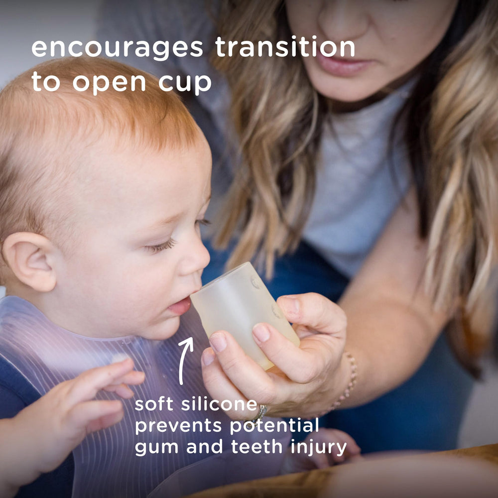 Olababy First Cup slanted design guides hands for easier sipping.