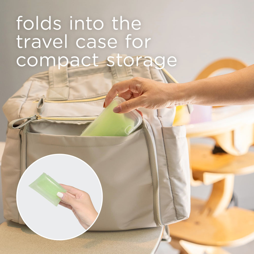 Olababy Fold N Go bib in use with travel case during travel