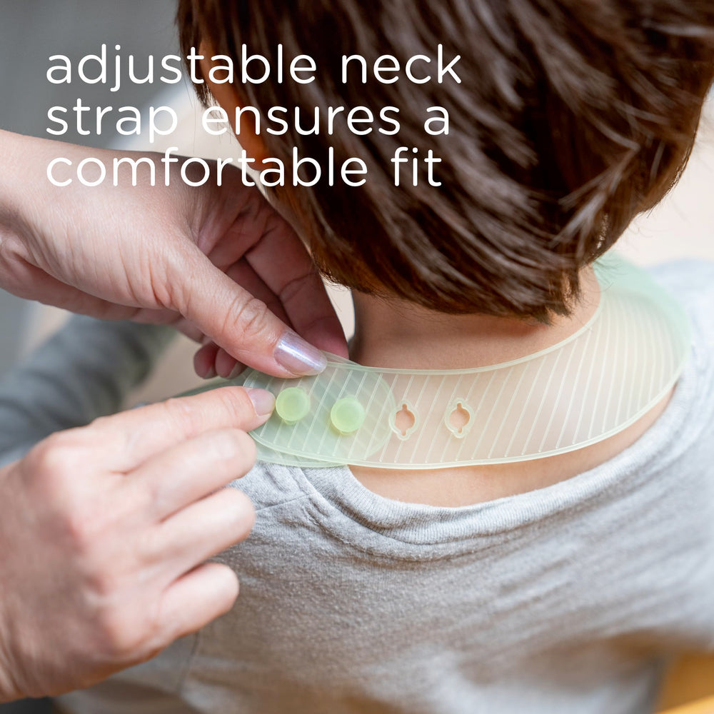 Olababy Fold N Go bib worn by baby during feeding