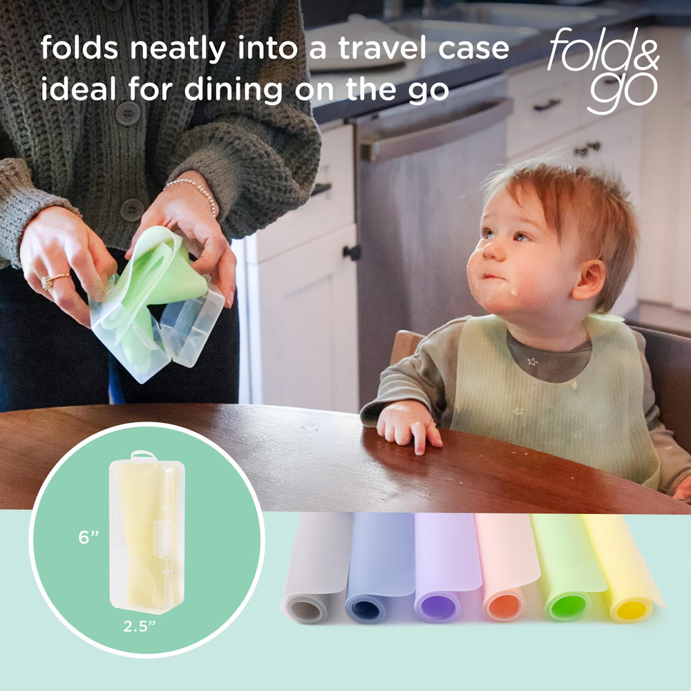 Olababy Fold N Go placemat with non-slip bottom on a smooth table surface