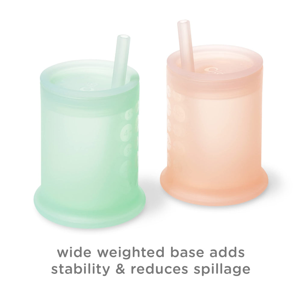 Olababy training cup includes straw lid and straw cleaning brush.