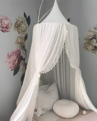 OldPAPA Kids Bed Canopy with pom poms creates cozy, light-blocked sleep space.