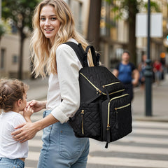 Omanmoli diaper bag backpack interior with pockets demonstrates quick access and tidy baby essentials