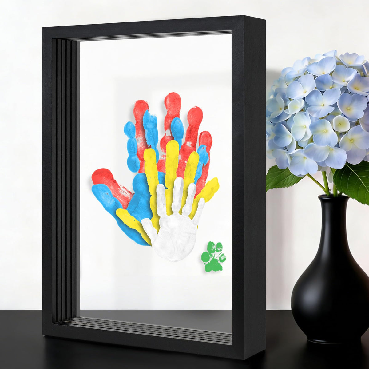 Omrhvi family handprint kit contents with frame, paints, and tools for an easy keepsake
