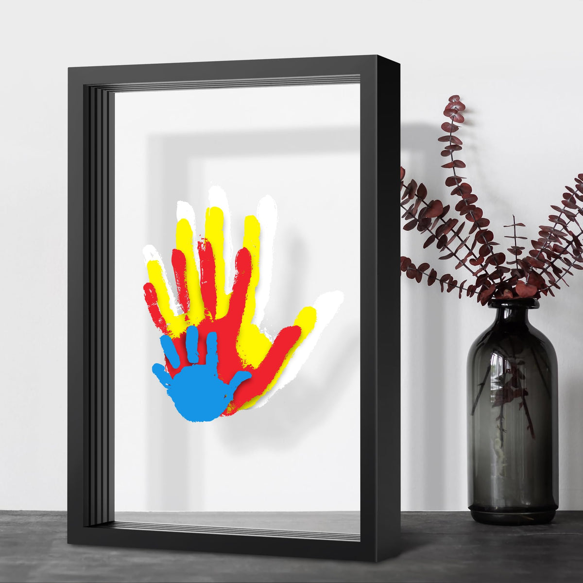 Omrhvi family handprint kit in wooden frame ready for display