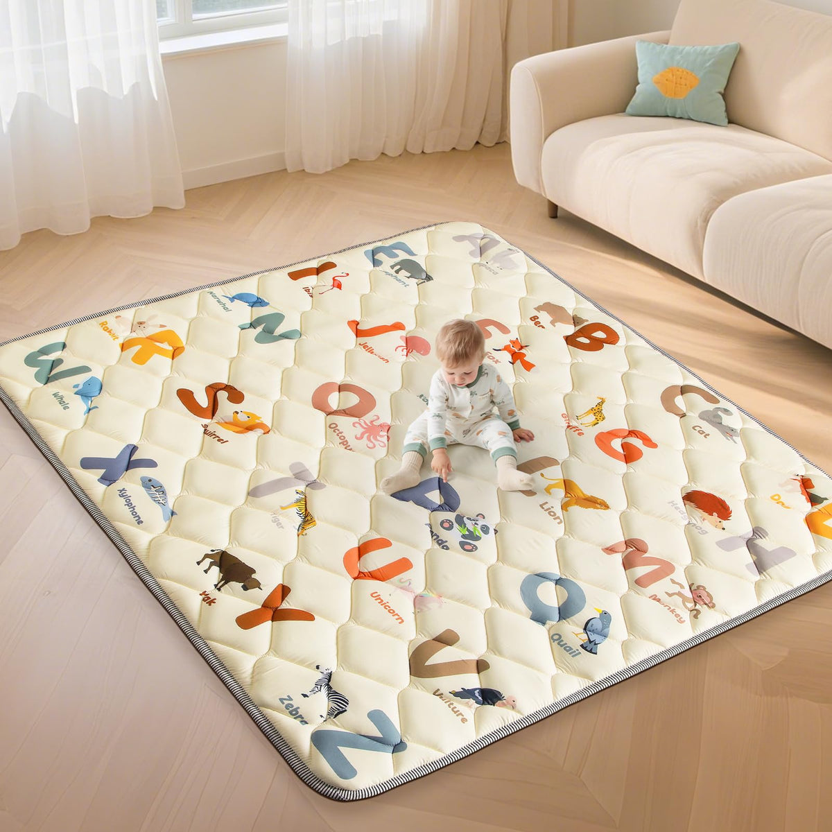 Omzer baby play mat folded compact for travel and storage.