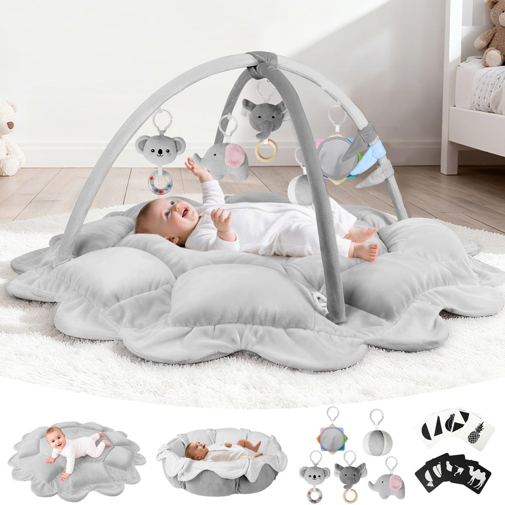 Omzer Plush Baby Play Gym assembled on the floor with a stable, non-slip surface for tummy time.