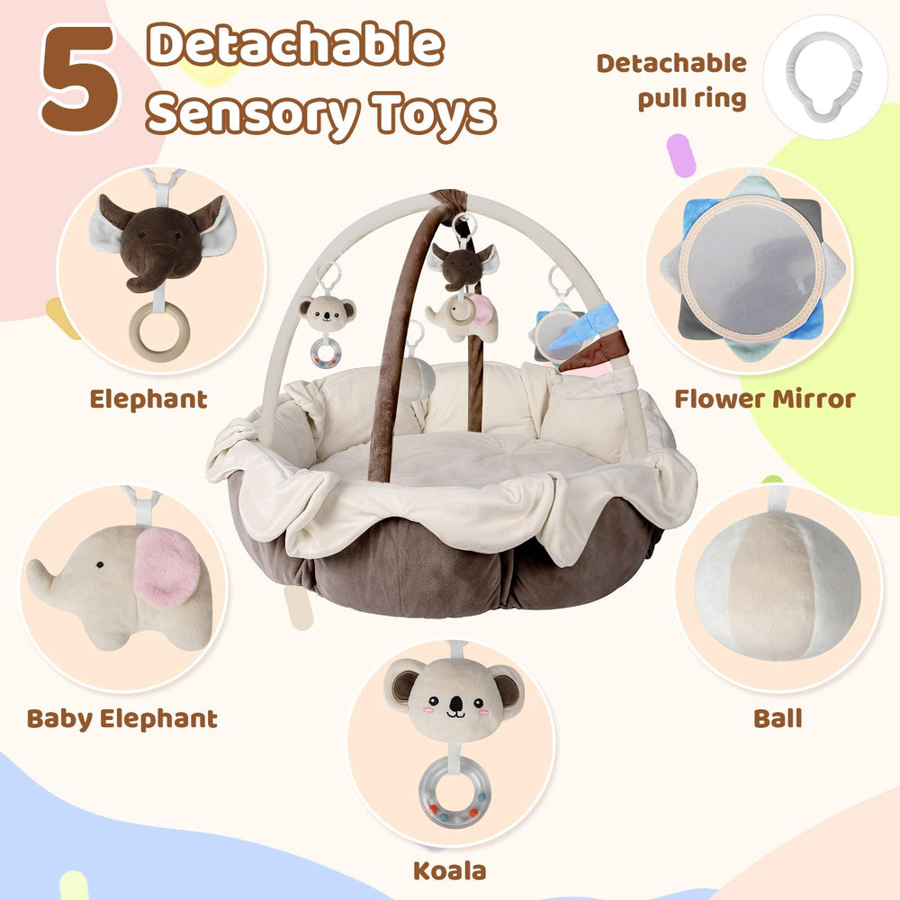 Omzer sensory toys attached for tactile exploration and sound development during play.