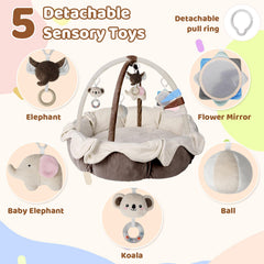 Omzer sensory toys attached for tactile exploration and sound development during play.