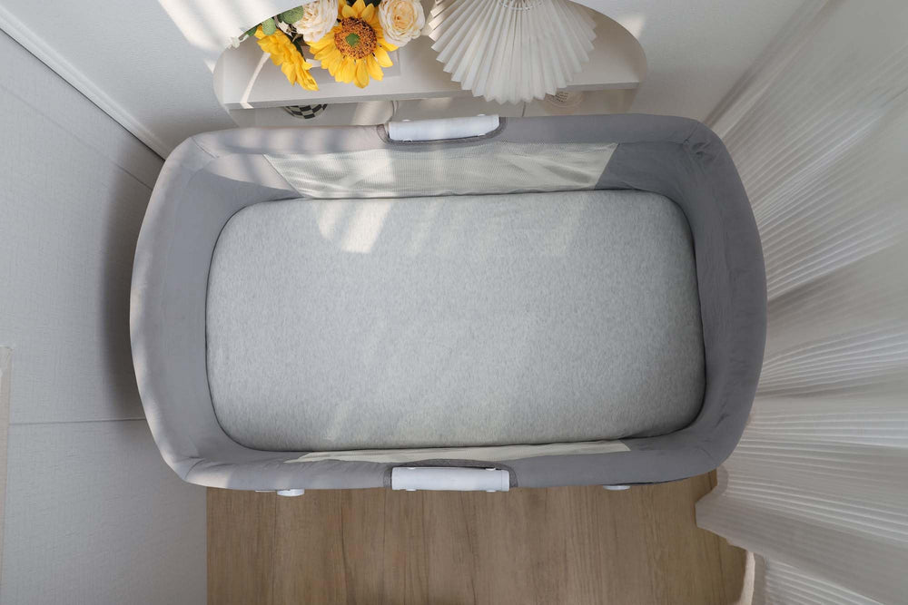 Onacosht gender-neutral design coordinates with any nursery style.