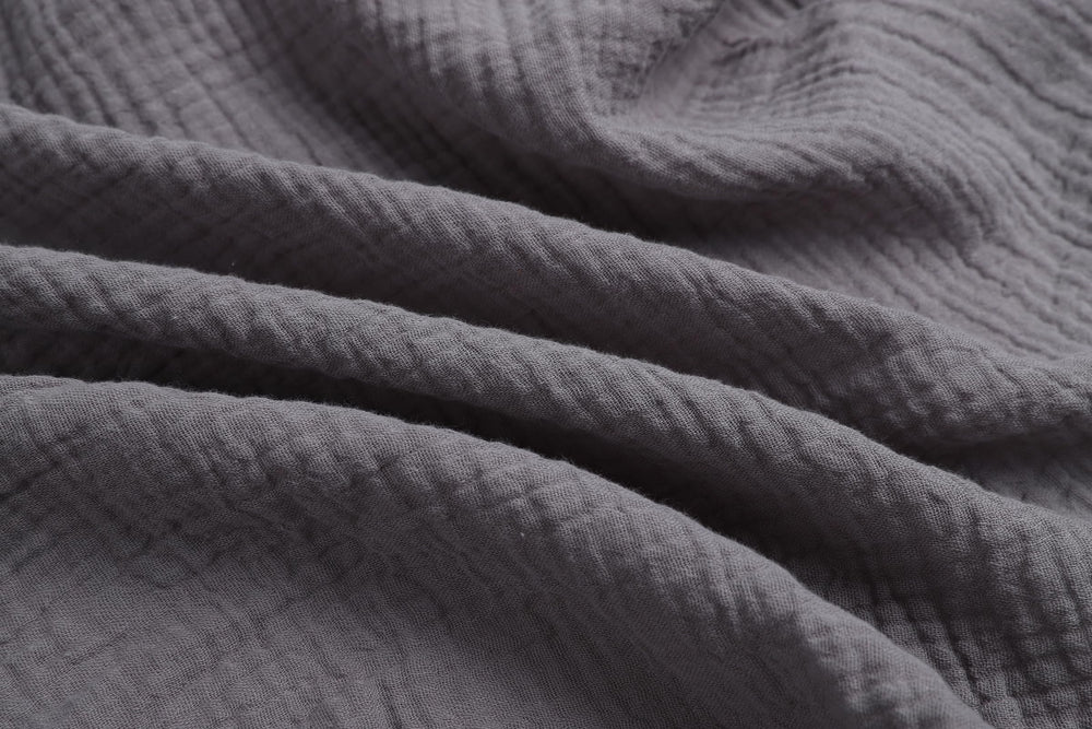 Onacosht muslin bassinet sheets grey pack image highlights neutral color for coordinating nursery styles.