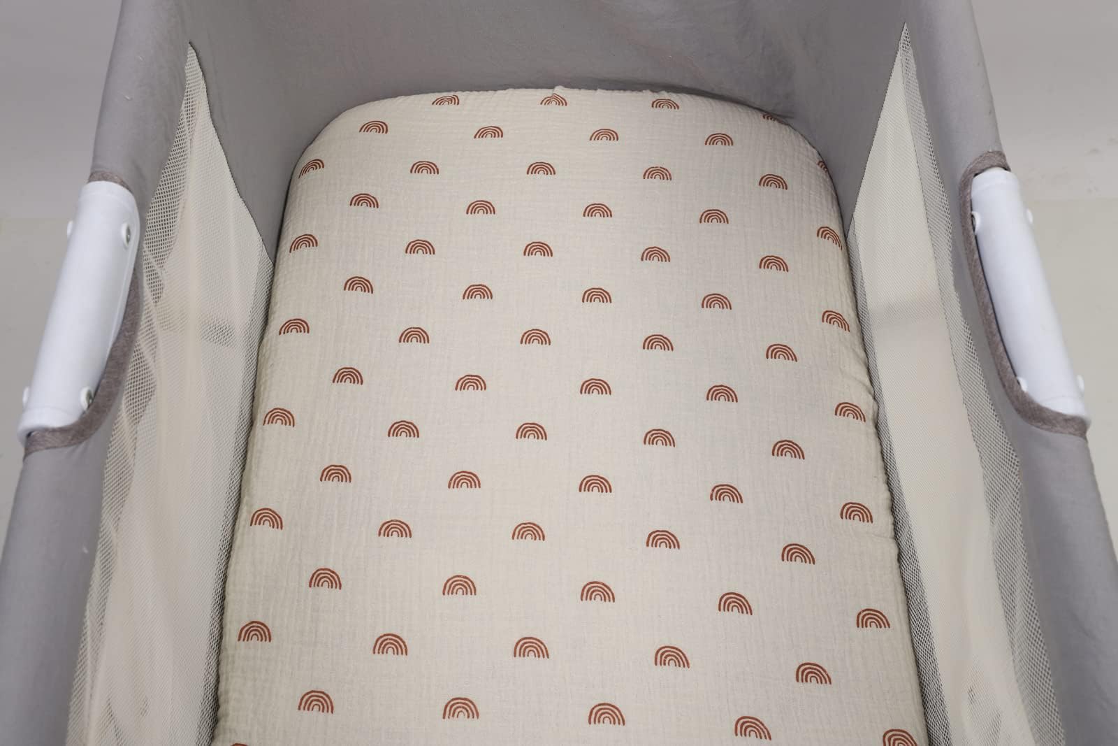Onacosht muslin bassinet sheets care and wash close-up indicating care ease