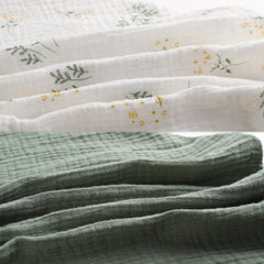 Onacosht muslin nursing pillow cover 2-pack side view shows breathable weave and fit.