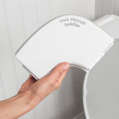 One Proud Toddler potty seat folded-compact for easy packing during travel.