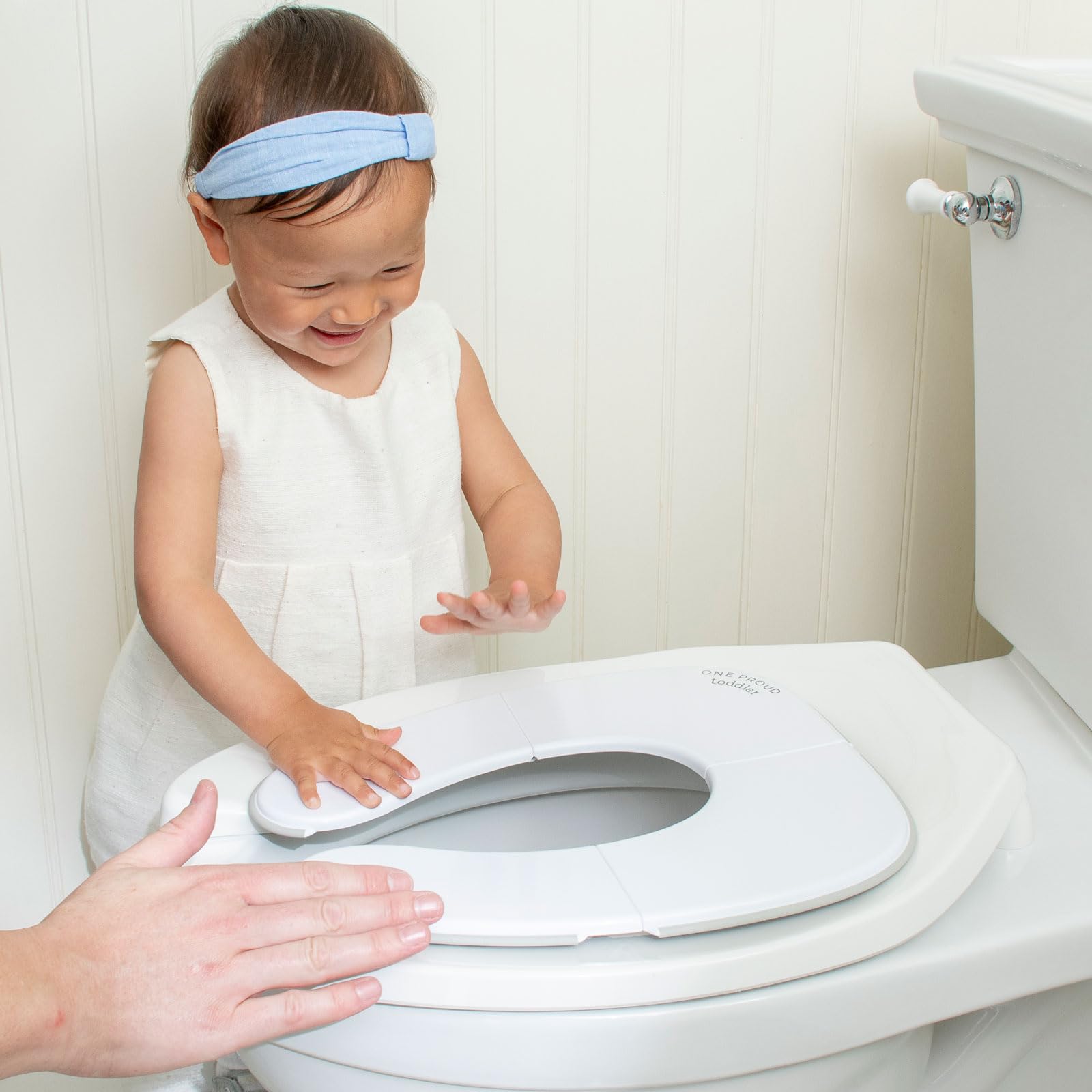 One Proud Toddler seat compatible with round, elongated, and open-front toilets.