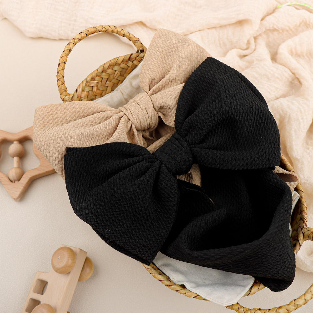 ONENINEDREAM baby outfits-beige-bow; versatile accessory for many looks.
