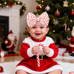 ONENINEDREAM candy cane bow red headband adds holiday cheer for newborns and toddlers.