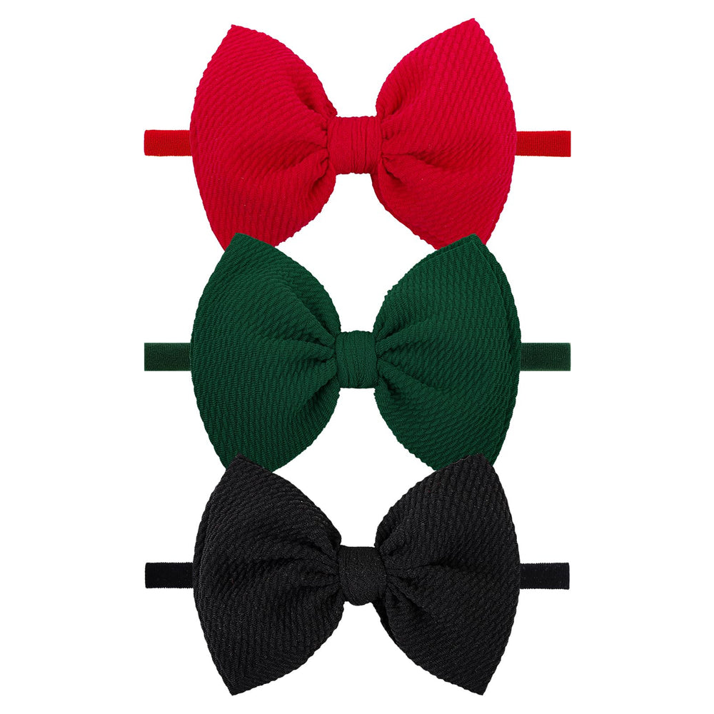 ONENINEDREAM Christmas headband set with red, green, and black bows adds festive outfit flair.