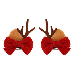 ONENINEDREAM Christmas velvet bow clip closeup with soft red fabric and secure alligator grip.