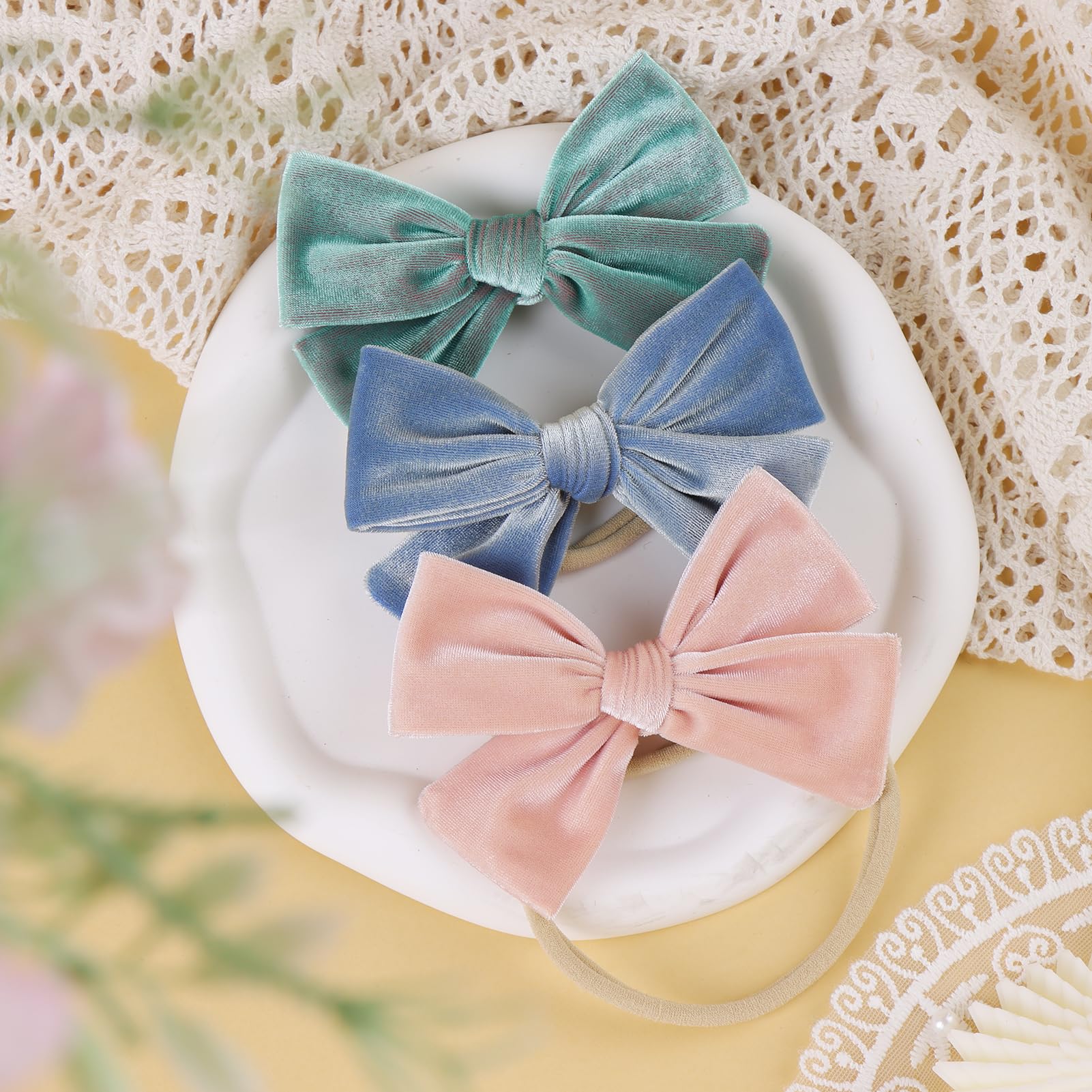ONENINEDREAM handmade headbands, secure fit for newborns and infants.