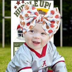 ONENINEDREAM helmet-pattern bow highlighting game-day theme
