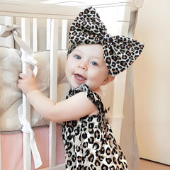 ONENINEDREAM leopard print brown bow headband; comfortable fit for infants and toddlers.