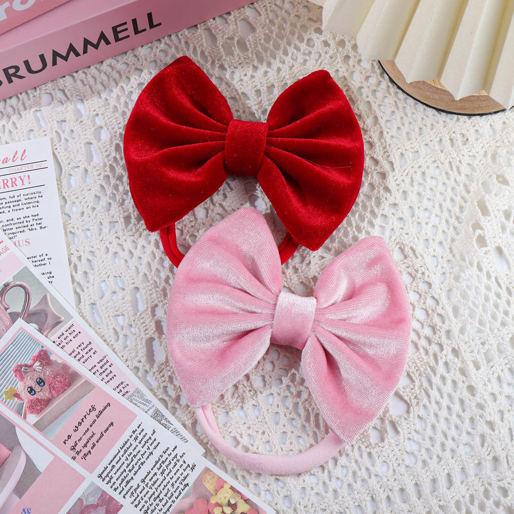 ONENINEDREAM baby girls bows collection displayed with colorful outfits.