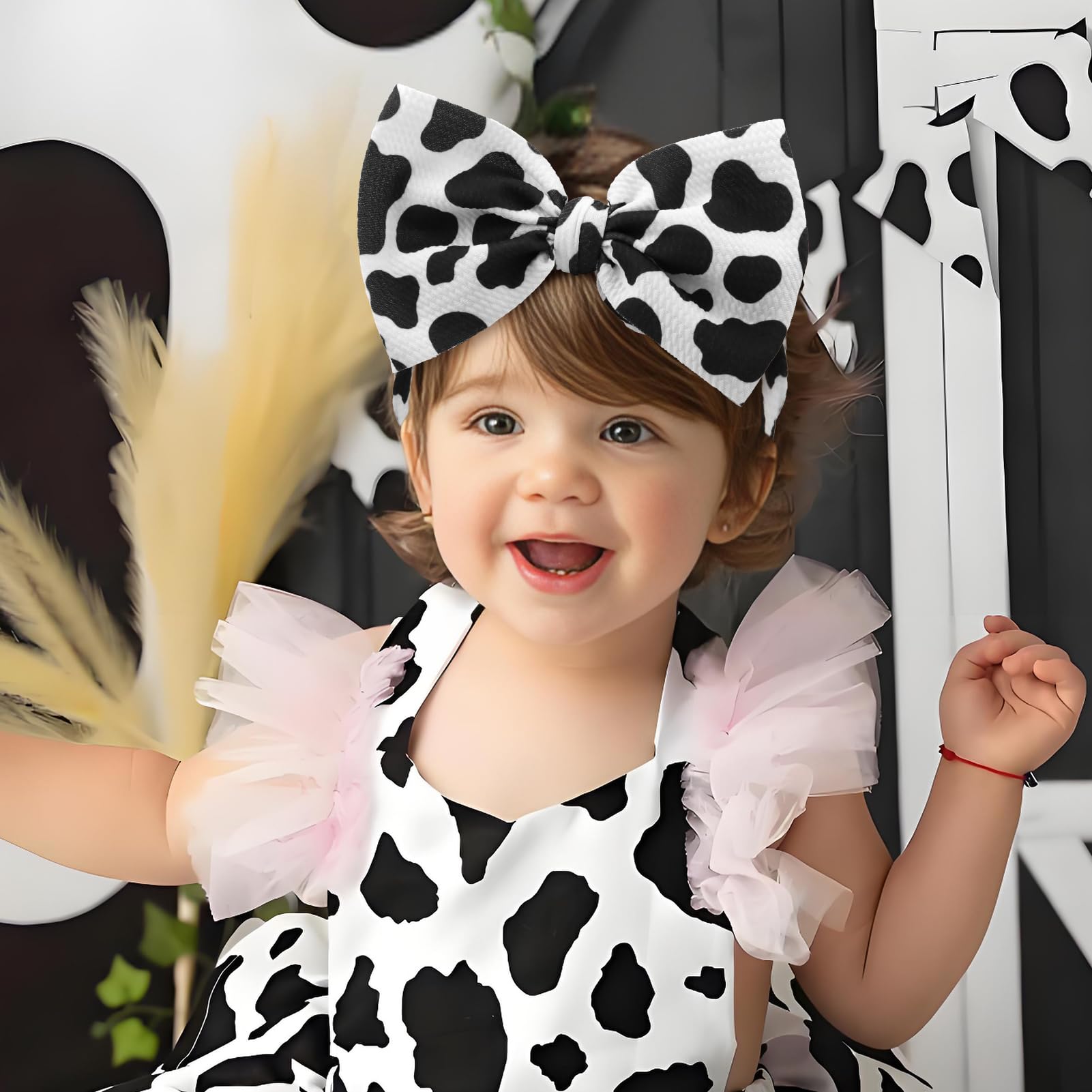 ONENINEDREAM pink and cow print 7in bow boosts sweet farmhouse style.
