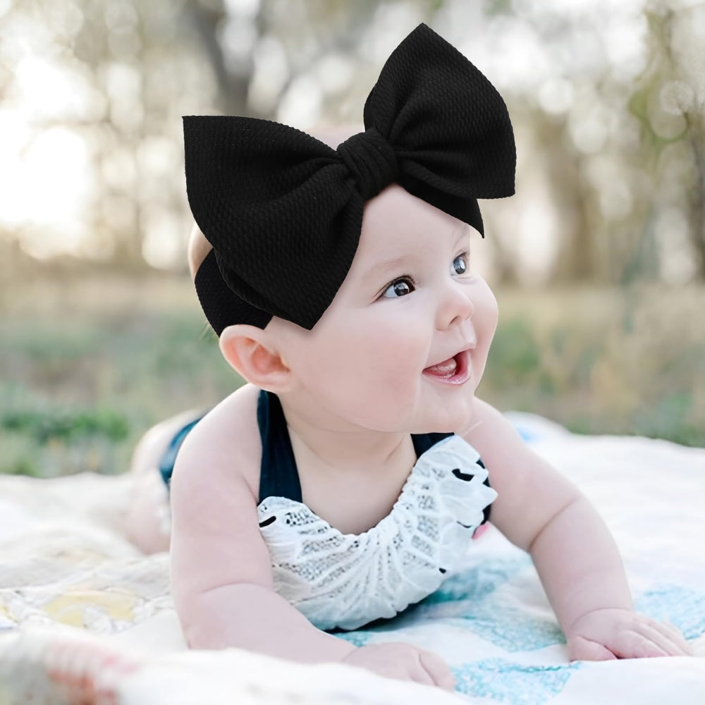 ONENINEDREAM soft knot headband black-bow; classic elegance with secure wear.