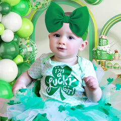 ONENINEDREAM st patricks day hairband green bow shamrock print close-up for festive styling.