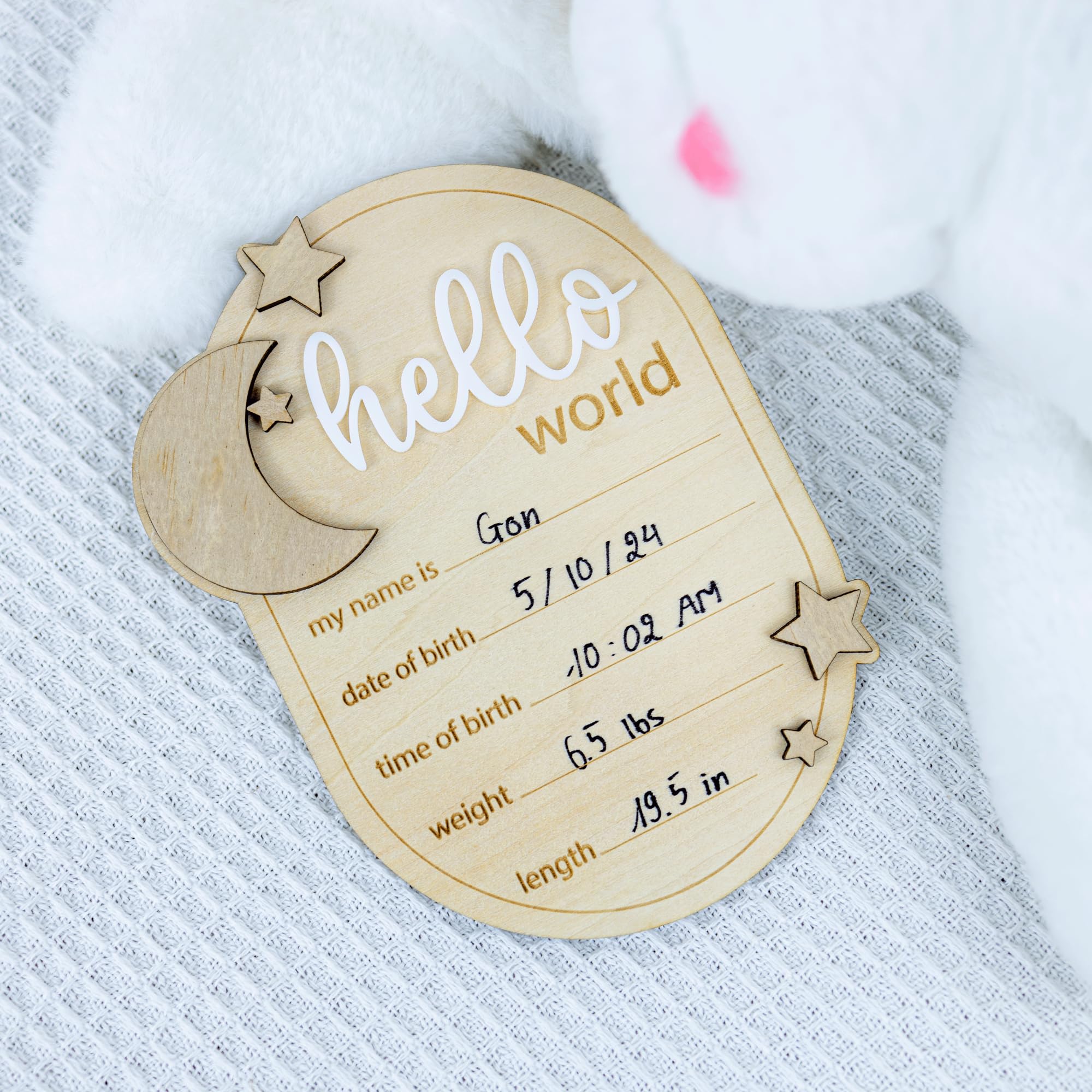 ONNIBE newborn photo prop sign shown in hospital or home shoots.