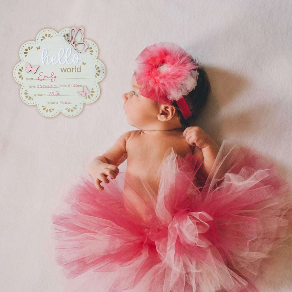 ONNIBE sign as photo prop for newborn captures at hospital or home