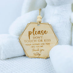 ONNIBE baby shower sign featuring rainbow design and gentle reminder.