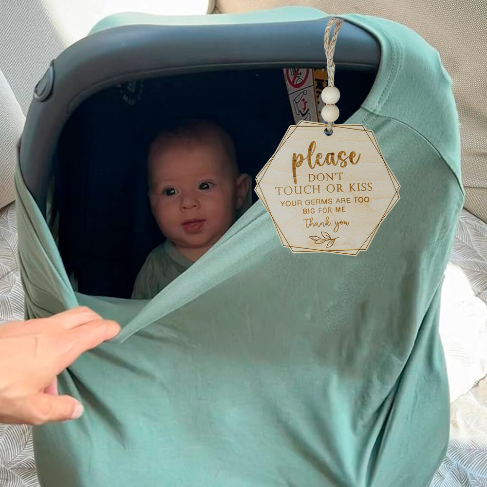 ONNIBE wooden sign used as a photo prop for newborn shoots.