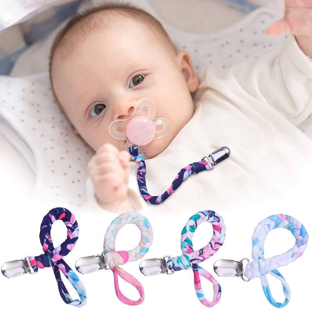 Onwon pacifier clip in-use image shows safe attachment to clothing for mess-free moments.