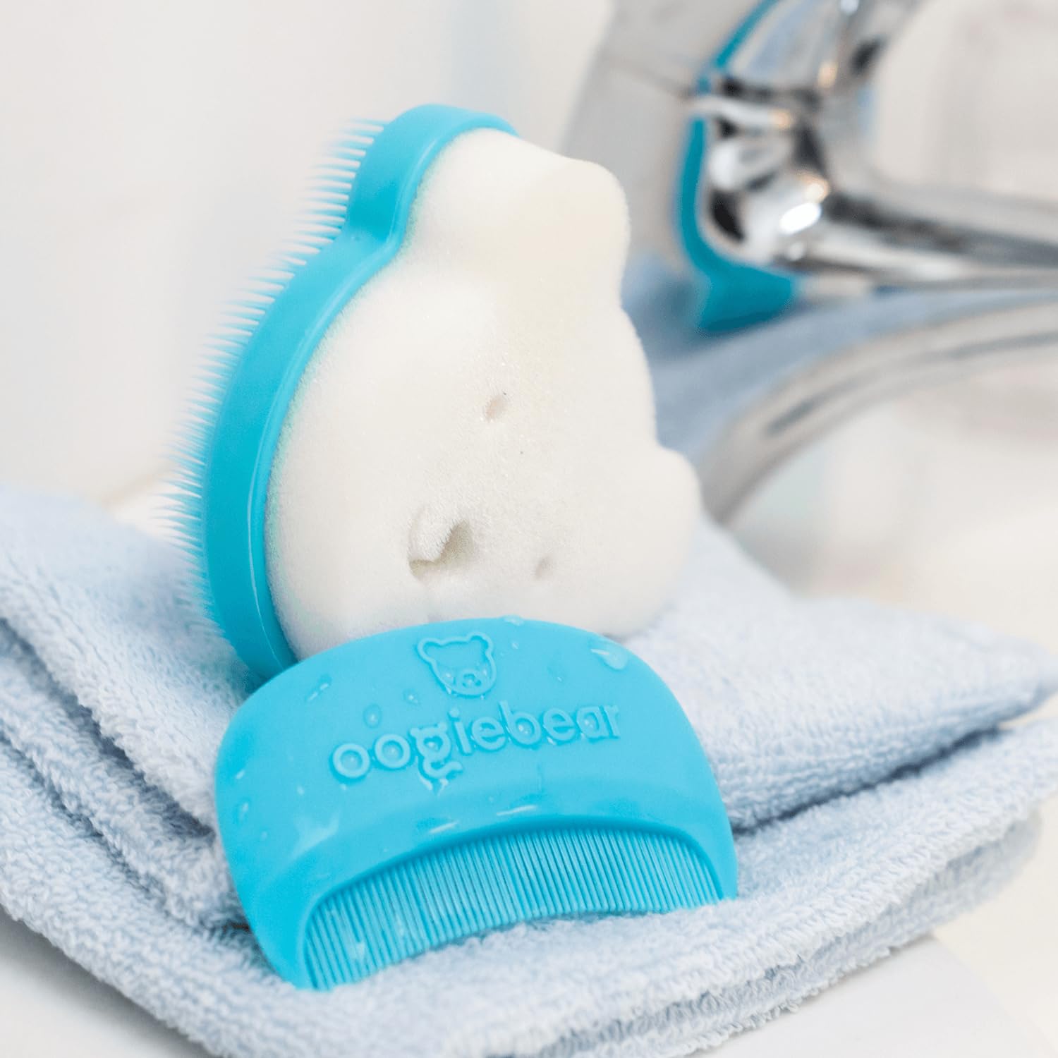 oogiebear cradle-cap brush kit ergonomic-design shot highlights parent-friendly grip for grooming