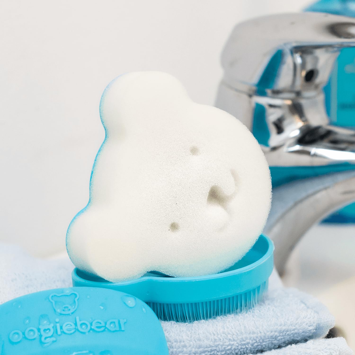 oogiebear cradle-cap brush kit safe-newborn scene emphasizes gentle baby-safe materials