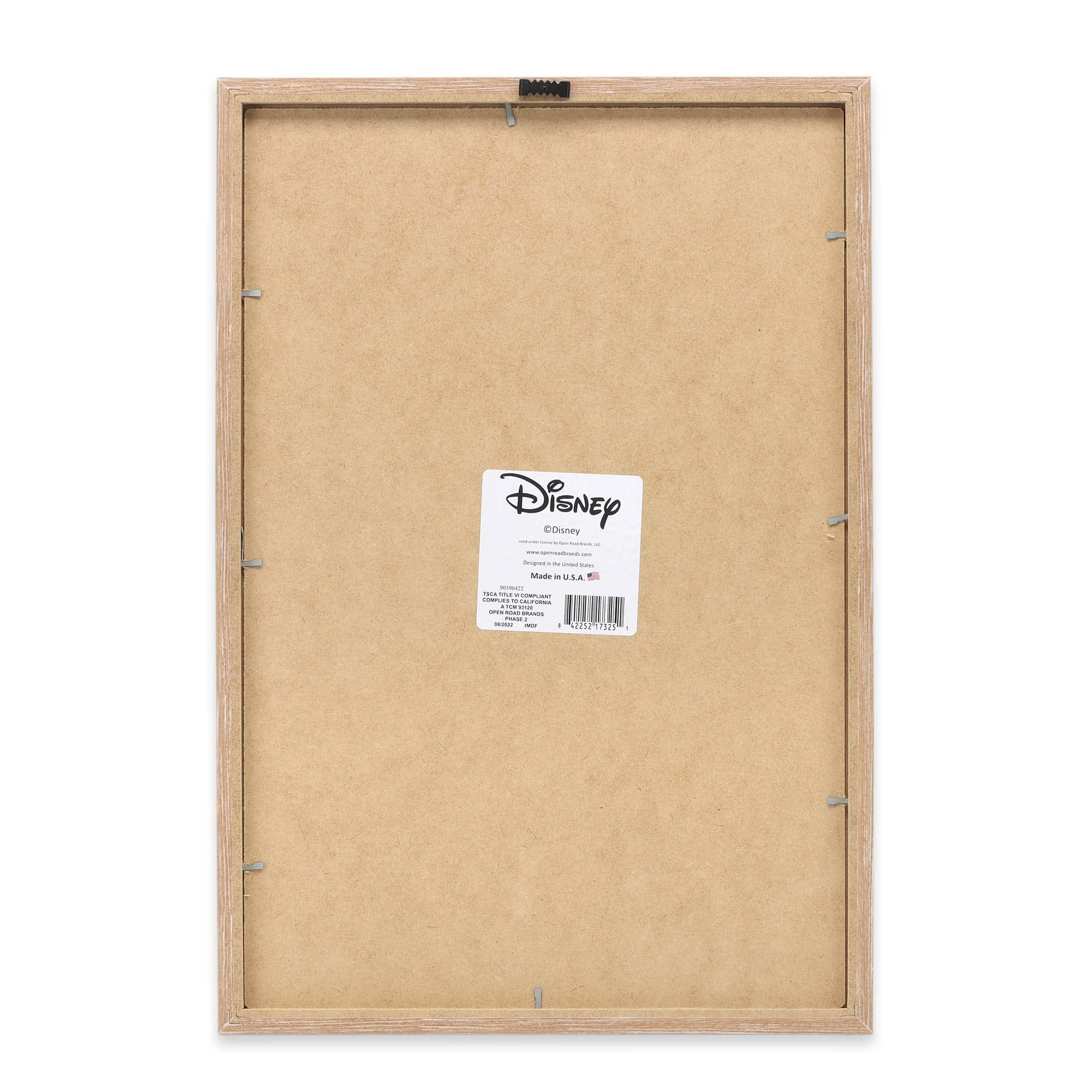 Disney licensed Dumbo framed wood art by Open Road Brands adds timeless nursery charm.