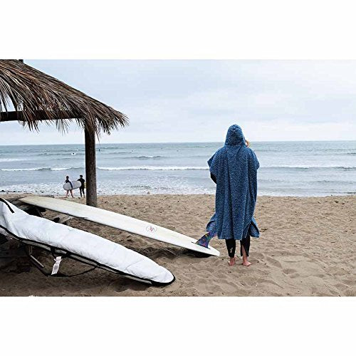 Open Road Goods Surf Poncho brand tag closeup, eco-friendly mission.