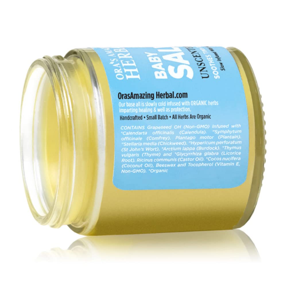 Ora’s Amazing Herbal Baby Salve applied to a baby's cheek for soothing care