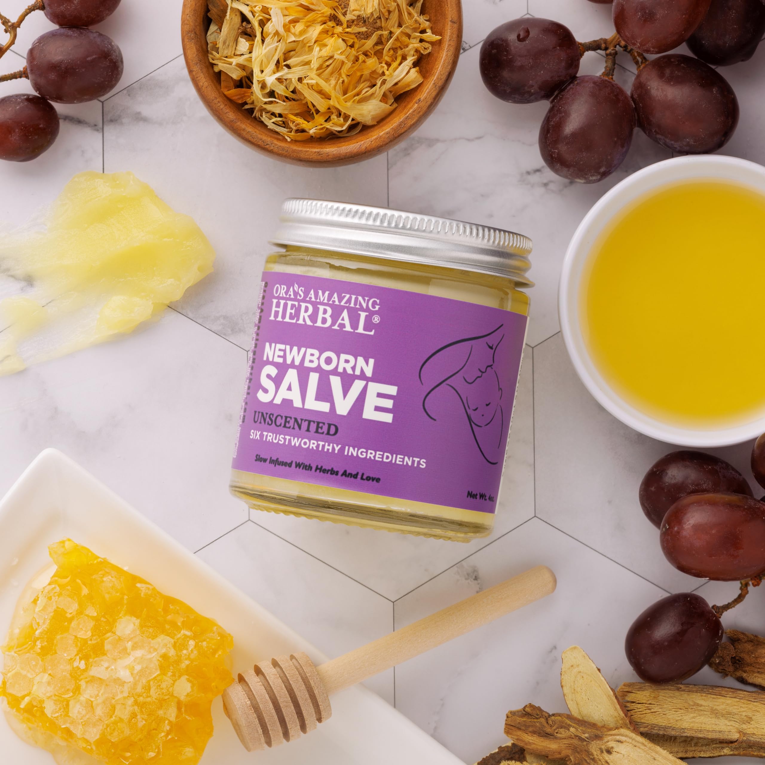 Ora's Amazing Herbal Newborn Salve in glass packaging demonstrating sustainability.