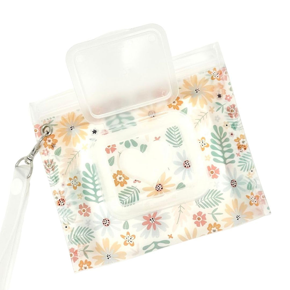 Orchid Hearts wipes dispenser mini fits in a diaper bag for on-the-go freshness.