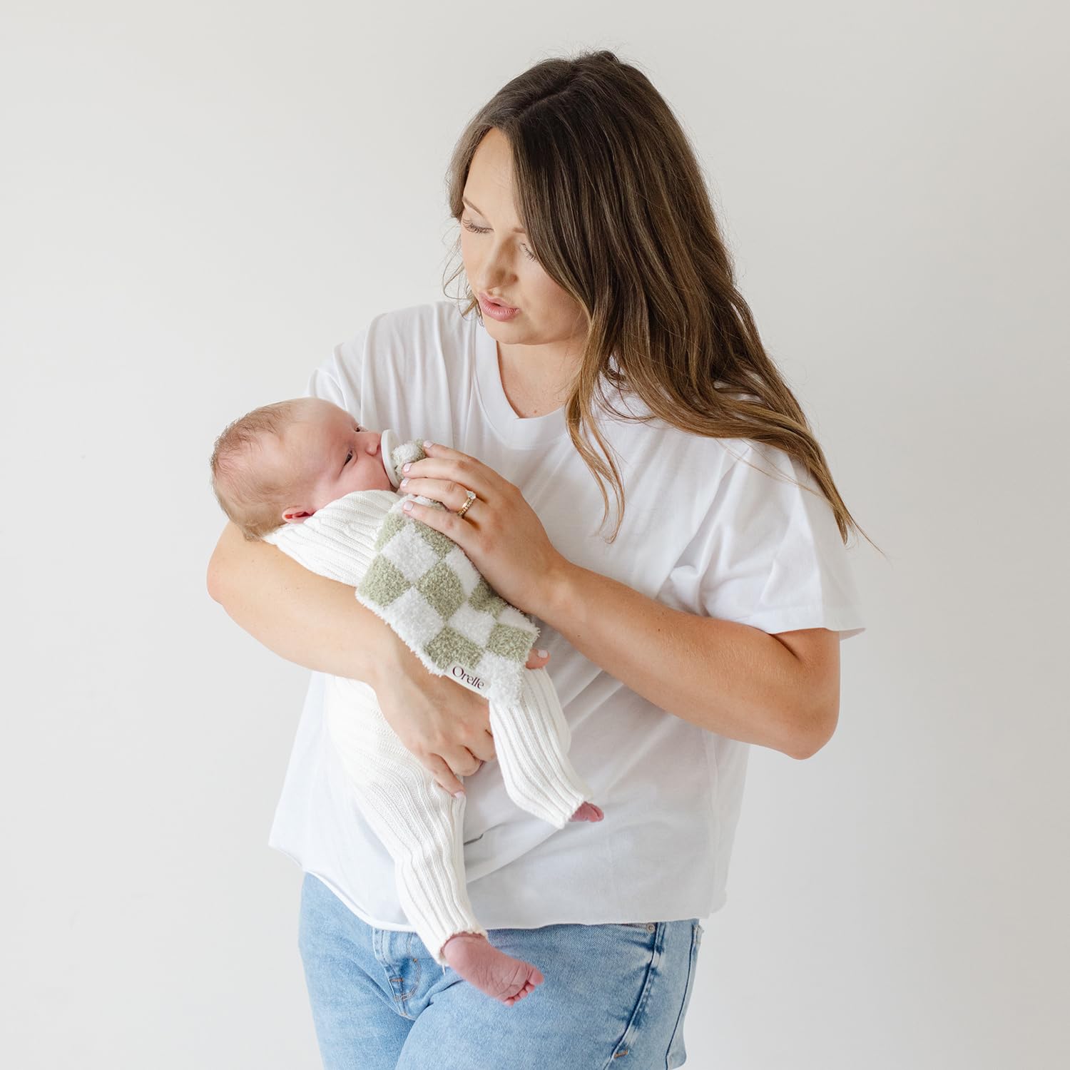 Orelle checkered lovey 9x9 size shows easy grip for little hands and portable comfort
